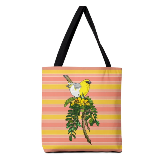 An illustration of a palila, a yellow, white, and gray Hawaiian honeycreeper perched on a yellow blooming mamāne branch, centered on a striped yellow and pink tote bag