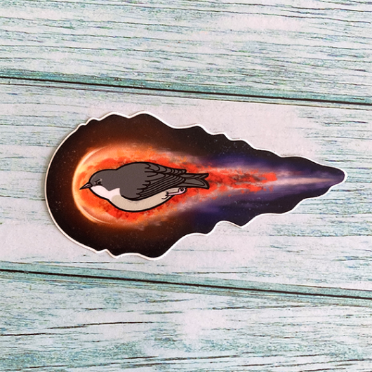 Sticker with a cartoon Hawaiian honeycreeper flying through outer space in a fireball like a meteor like a super hero.